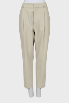 Beige trousers with a mid-rise