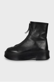 Leather boots decorated with lightning