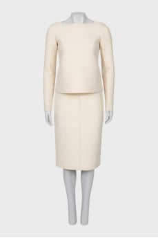 Suit with a soft fabric skirt
