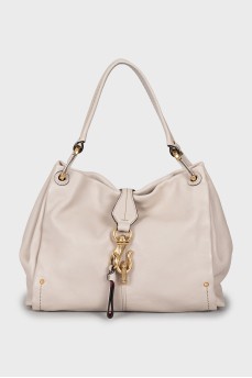 Leather bag with magnetic clasp