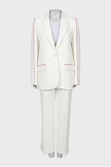 White suit with accent stripes