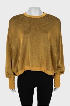 Gold colored sweater