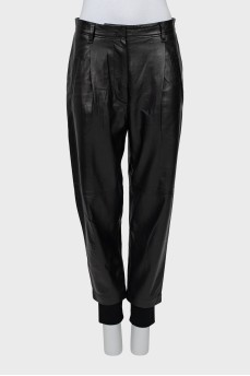 Leather trousers with textile inserts