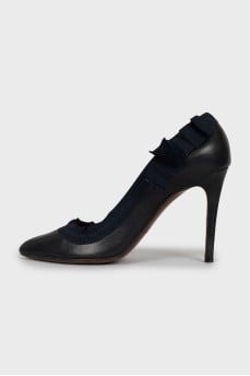 Leather shoes with textile decor