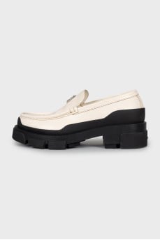 Black and white loafers
