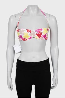 Swimsuit with a bright print and tag