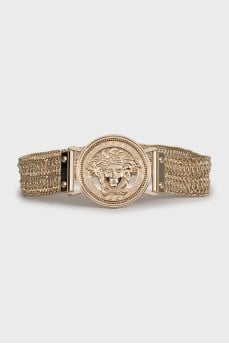 Metallic belt in gold color