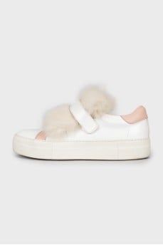 Leather sneakers decorated with fur