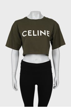 Green top with signature print