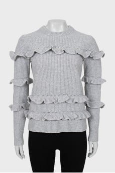 Knitted sweater in gray color