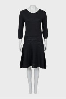 Fitted dress with flared skirt