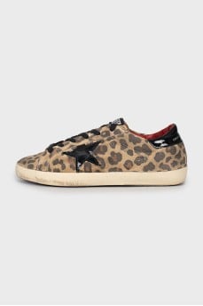 Suede sneakers with animal print