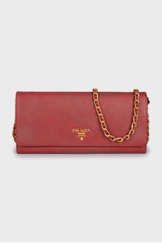 Leather clutch with brand logo