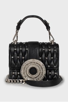 Leather bag decorated with crystals