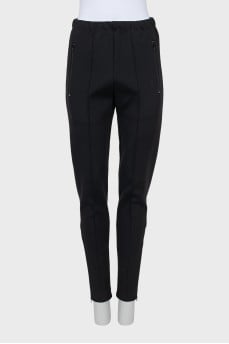 Tapered trousers with zippers on the sides