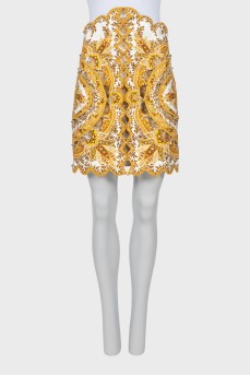 Skirt decorated with golden beads