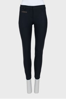 Tapered trousers with metallic decor