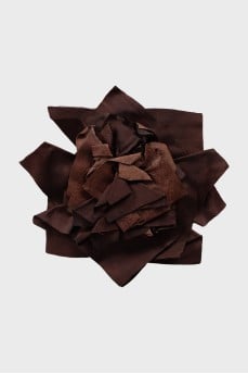 Brooch made of textile and leather