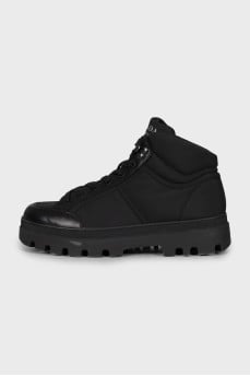 Men's black boots with a massive sole