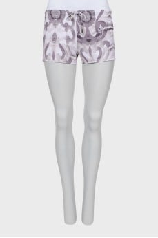 Swim shorts with ties and tag