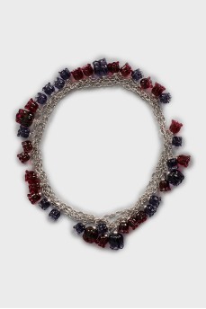 Silver necklace decorated with flowers