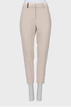 Beige trousers with silk belt