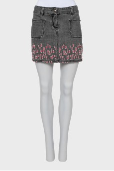 Mini skirt with ripped effect