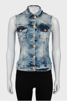 Denim vest with crystals on the back