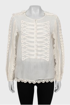 White silk blouse with fringe