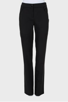 Tapered trousers with a mid-waist