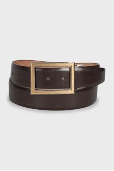 Men's belt with a shaped buckle