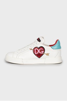 Leather sneakers decorated with a patch