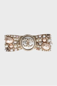 Brooch decorated with beads and crystals