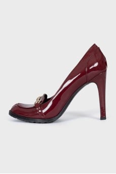 Red shoes with gold decor