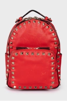 Leather backpack decorated with spikes