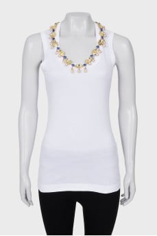 White T-shirt decorated with rhinestones