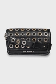Leather bag decorated with eyelets
