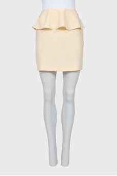 Skirt decorated with a peplum