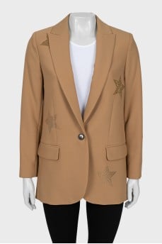 Jacket decorated with rhinestones with a tag
