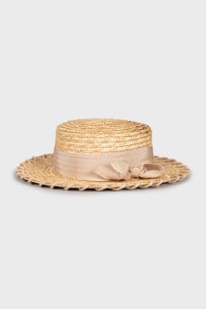 Straw hat with chain and bow