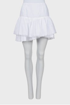 Skirt with rhinestones on the hem with a tag