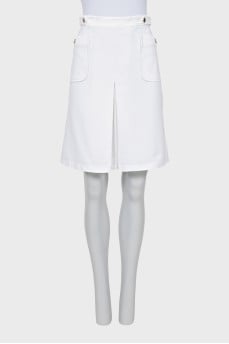 White skirt with gold fittings