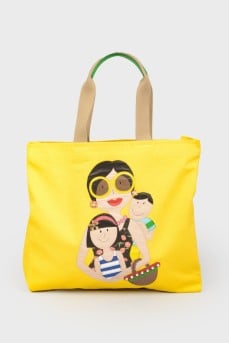 Yellow shopper with a print with a tag