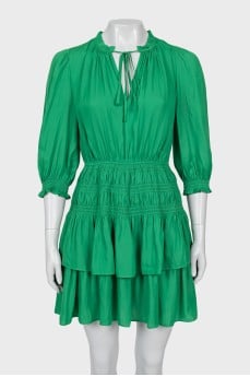 Fitted green dress with tag
