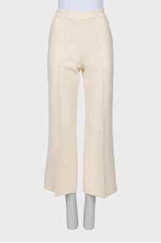 Straight trousers with side fastening