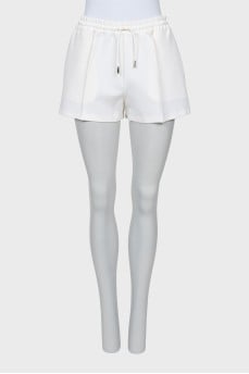 White shorts with ties