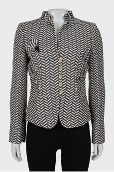 Vintage jacket decorated with a brooch
