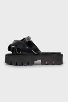Black flip flops with high soles