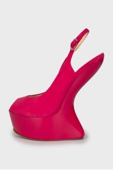 Sandals with a figured wedge heel