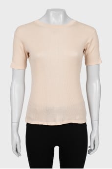 Tight fitting pink t-shirt